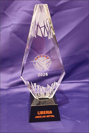 Thick crystal Arrow shaped award. Sandblasted and colour details