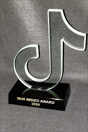 Profile cut glass award on a black crystal base