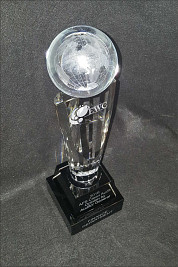 Fluted crystal pedestal with a lasered world ball